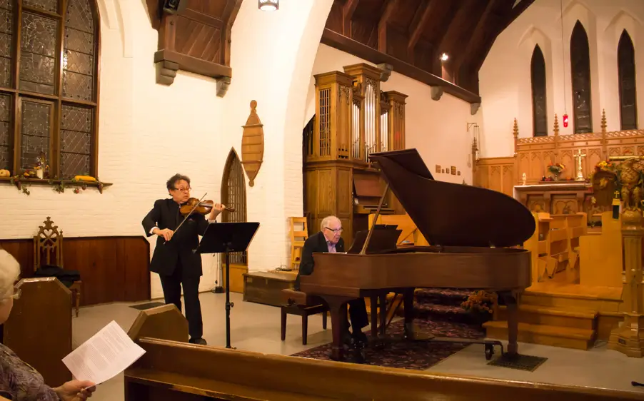 Pianist Robert Silverman and violinist Atis Bankas playing at StirlingFest in the Anglican Church